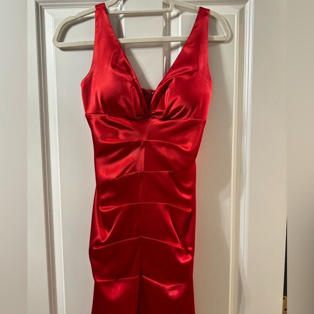 Red cocktail dress. Bought at boutique.